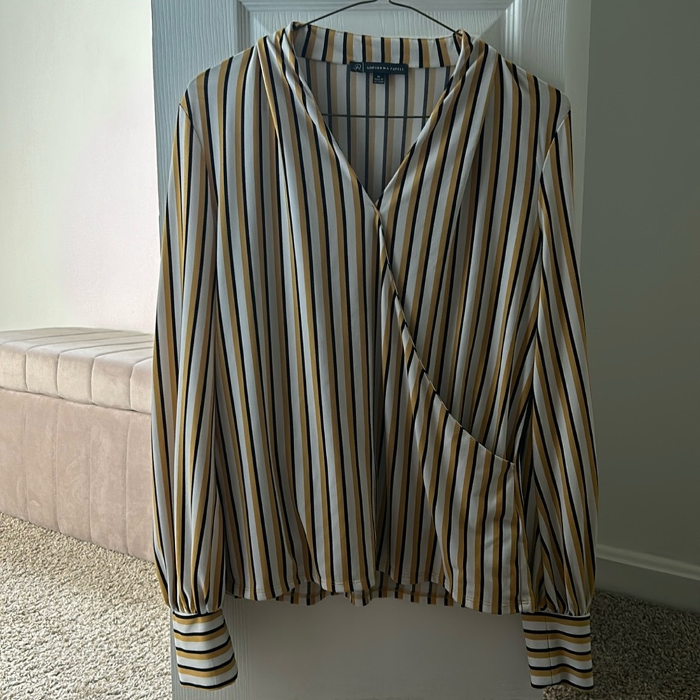 Slimming striped long sleeve shirt. Size Medium. Barely worn